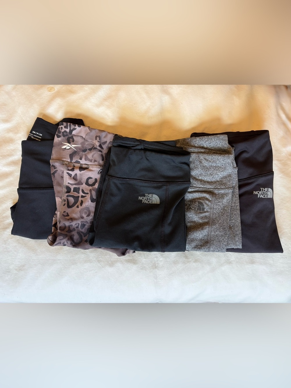 Lot of 5 leggings - North Face, Reebok and Helly Hansen - size women’s small